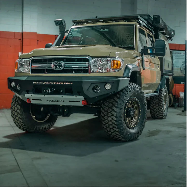 Tan Toyota Land Cruiser with Rockarmor GT Steel Hoopless Bullbar and off-road mods