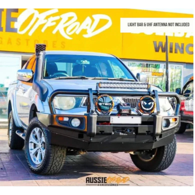 Silver off-road truck with steel bull bar and fog lights, suitable for Mitsubishi Triton Challenger