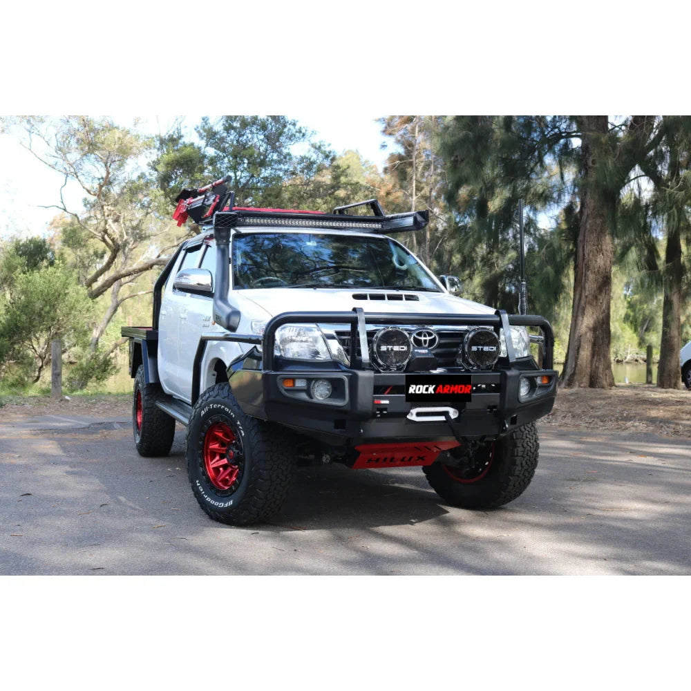 White off-road pickup truck with Rockarmor premium steel bullbar and fog lights