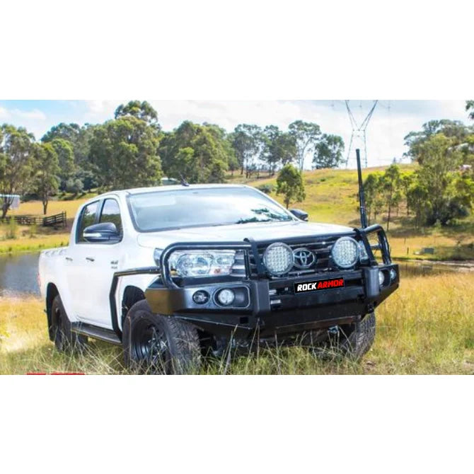 White toyota hilux with black brush bar fitted with rockarmor steel rockslider checker plate side steps n90 2026+